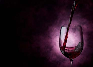 Red wine poured in a glass