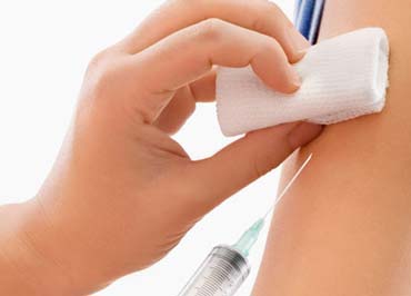 Vaccine injection on the arm